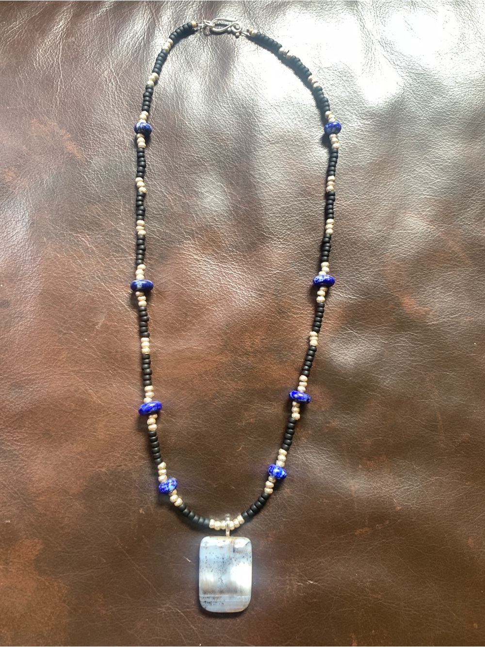 Black and Blue Beaded Necklace with Agate Pendant